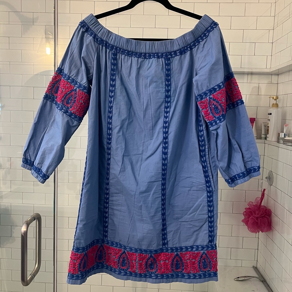 Gorgeous embroidered blue dress.